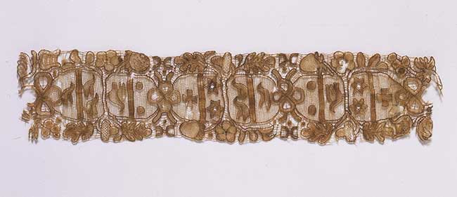 Band of needle lace worked in human hair