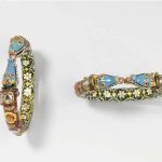 A PAIR OF MUGHAL INSET AND ENAMELLED GOLD BRACELETS