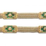 A pair of gold, enamel, ruby and diamond bracelets