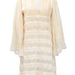 A beige cotton short dress with eyelet lace inserts