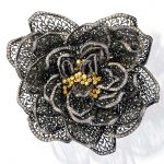 RARE COLOURED DIAMOND AND DIAMOND FLOWER BROOCH, LÉON COULON