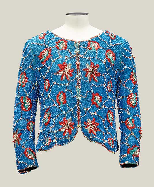 CHRISTIAN DIOR BOUTIQUE, circa 1960 A blue and red chenille and pearl embroidered jacket