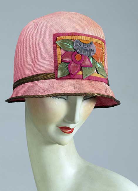 Cloche style hat made of smooth, pink plaited straw