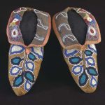 A PAIR OF CHEROKEE BEADED HIDE MOCCASINS