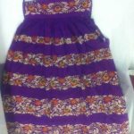 Skirt, purple silk, with bands of multi-coloured floral embroidery.