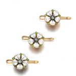 A set of three enamel, demantoid garnet and diamond dress buttons, circa 1905