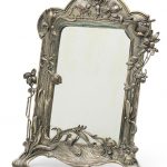 An art nouveau silver-plated dressing table mirror