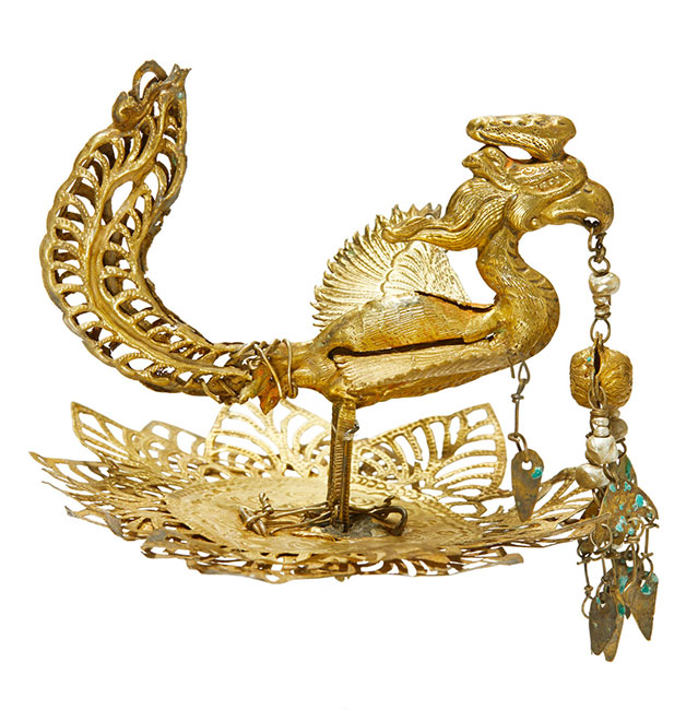 A rare gilt silver head ornament in the form of a phoenix 9th-11th century