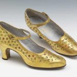 Pair of woman's evening shoes of painted gold kid